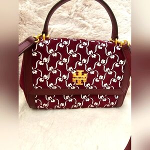 Tory Burch $648 limited addition clap bag, with magnet closure. From butique.…